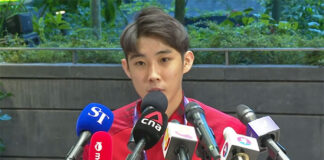 Loh Kean Yew speaks to Singaporean media at Changi Airport. (source: Screenshot ST YouTube)