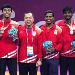 Tan Kim Her (third from left) is not returning for a second stint as the doubles coach of the Indian badminton team. (photo: Free Press)