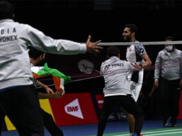 Teammates rush to the court after HS Prannoy scores the winning point to give India a 3-2 victory against Denmark in the 2022 Thomas Cup semi-final. (photo: Shi Tang/Getty Images)