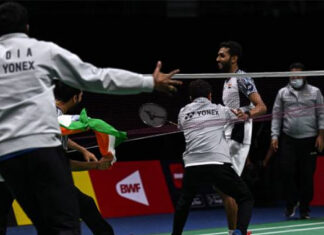 Teammates rush to the court after HS Prannoy scores the winning point to give India a 3-2 victory against Denmark in the 2022 Thomas Cup semi-final. (photo: Shi Tang/Getty Images)