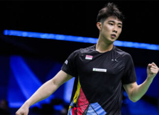 Loh Kean Yew pumps his fist after beating Anthony Sinisuka Ginting in the tie between Singapore and Indonesia. (photo: Shi Tang/Getty Images)