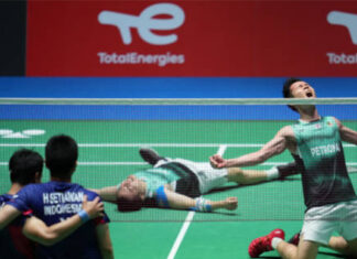 Aaron Chia/Soh Wooi Yik celebrate after clinching the match-point. (photo: Toru Hanai/Getty Images)