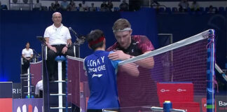 Viktor Axelsen greets Loh Kean Yew after Friday's French Open quarter-final match.
