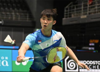 Loh Kean Yew survives a tough challenge from Li Shi Feng in the three-set comeback. (photo: Luis Veniegra/Getty Images)
