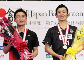 Kento Momota and Kenta Nishimoto pose for pictures at the awards ceremony of the 2022 All Japan Championships. (photo: J Sugawara)