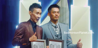 Lin Dan and Lee Chong Wei pose for pictures at the BWF Hall Of Fame induction ceremony.