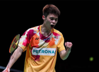 Ng Tze Yong's tenacity and skill help him emerge victorious in a thrilling showdown with Zhao Junpeng. (photo: Shi Tang/Getty Images)