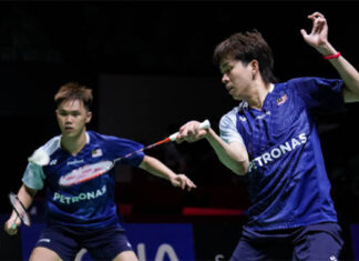 Man Wei Chong and Tee Kai Wun continuing their journey to the third round of World Championships. (photo: Shi Tang/Getty Images)