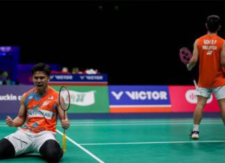 Goh Sze Fei/Nur Izzuddin celebrate after advancing to the 2024 Badminton Asia Championships semi-finals. (photo: Fred Lee/Getty Images)