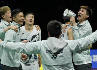 The Taiwanese players rush to the badminton court to celebrate after defeating Denmark 3-1 in the 2024 Thomas Cup quarterfinals. (Photo: Shi Tang/Getty Images)