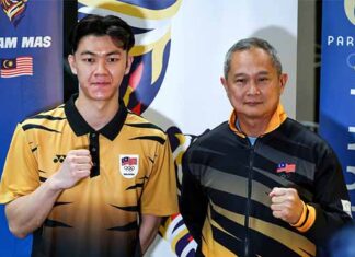 Lee Zii Jia and his coach Wong Tat Meng depart for Paris on Sunday. (Photo: Bernama)