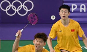Liu Yuchen, Ou Xuanyi are retiring from international badminton. (Photo: AFP)