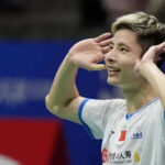 Shi Yuqi finally shows some happy faces after the 2024 Paris Olympics. (Photo: Xinhua)