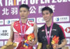 Loh Kean Yew (right) shares a moment of celebration with Chou Tien Chen during the 2025 Taipei Open awards ceremony. (Photo: BWF)