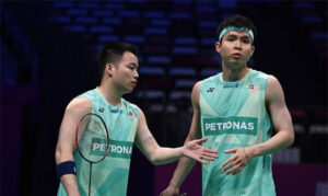 Aaron Chia and Soh Wooi Yik celebrate after securing a spot in the Thailand Open 2025 final — their second finals appearance of the season. (Photo: AFP)