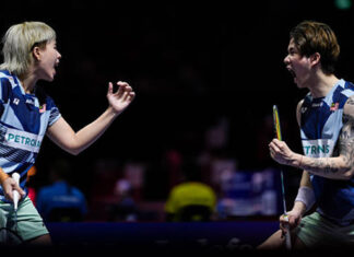 Chen Tang Jie and Toh Ee Wei train under coach Nova Widianto ahead of the Japan Open badminton tournament. (Photo: AFP)