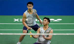 Goh Sze Fei and Nur Izzuddin celebrate their opening-round win at the 2025 Japan Open, setting the tone for their title defense. (Photo: AFP)