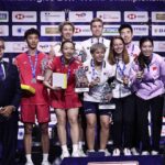 Chen/Toh standing on the top podium alongside silver and bronze medalists during the 2025 Badminton World Championships award ceremony in Paris. (Photo: AFP)