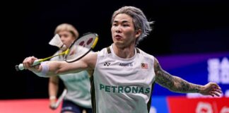 Chen Tang Jie and Toh Ee Wei showcasing strong teamwork and focus against the top-seeded Chinese pair. (Photo: AFP)