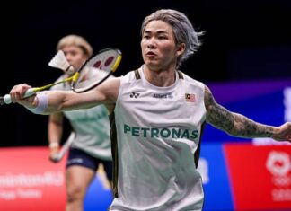 Chen Tang Jie and Toh Ee Wei showcasing strong teamwork and focus against the top-seeded Chinese pair. (Photo: AFP)