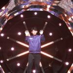 Liu Yuchen reflects on his career during the retirement ceremony in Hangzhou. (Photo: Xinhua)