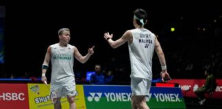 Aaron Chia and Soh Wooi Yik compete during the All England Badminton Championships 2026 in Birmingham. (Photo: AFP)