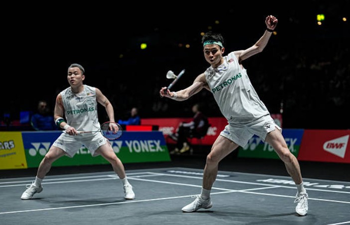 Aaron Chia and Soh Wooi Yik in action at the All England badminton championships in Birmingham. (Photo: AFP)