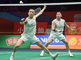 Malaysia’s Aaron Chia and Soh Wooi Yik compete in a tense quarterfinal match at the Badminton Asia Championships in Ningbo. (Photo: AFP)