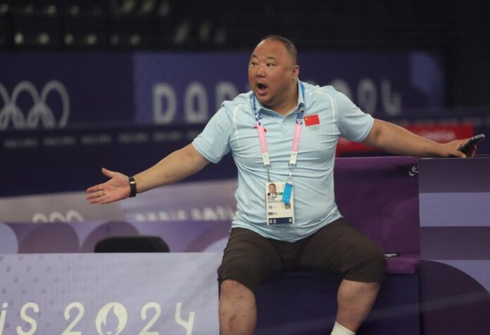 Zhang Jun, Olympic badminton gold medallist and president of the Chinese Badminton Association, during the 2024 Paris Olympics before being placed under investigation. (Photo: Xinhua)