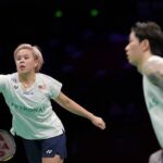 Malaysia’s top badminton mixed doubles pair Chen Tang Jie-Toh Ee Wei celebrate crucial victory at the 2026 Malaysia Masters in front of passionate home supporters. (Photo: AFP)