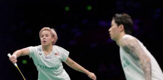 Malaysia’s top badminton mixed doubles pair Chen Tang Jie-Toh Ee Wei celebrate crucial victory at the 2026 Malaysia Masters in front of passionate home supporters. (Photo: AFP)