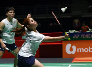Malaysian mixed doubles pair Jimmy Wong and Cheng Su Yin celebrating their massive badminton upset against world number ones at the Singapore Open. (Photo: Bernama)
