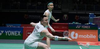 Malaysian men's doubles stars Aaron Chia and Soh Wooi Yik advance to second round after their straight-sets victory at the 2026 Singapore Open. (Photo: AFP)