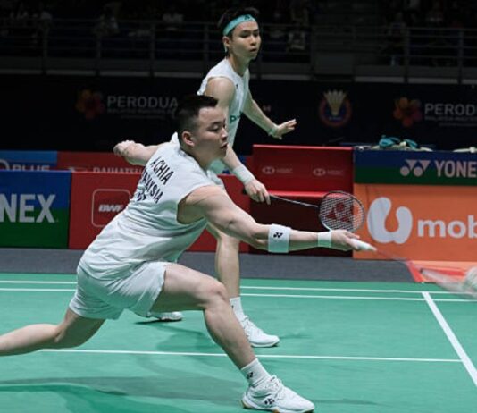 Malaysian men's doubles stars Aaron Chia and Soh Wooi Yik advance to second round after their straight-sets victory at the 2026 Singapore Open. (Photo: AFP)