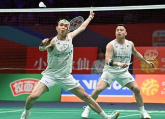 Malaysia badminton stars Aaron Chia-Soh Wooi Yik advance to Singapore Open quarter-finals. (Photo: AFP)