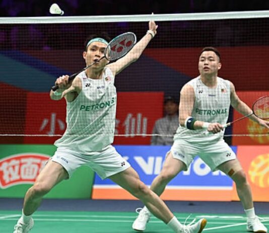 Malaysia badminton stars Aaron Chia-Soh Wooi Yik advance to Singapore Open quarter-finals. (Photo: AFP)