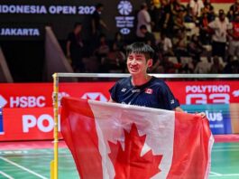 Victor Lai Makes History as An Se Young Defends Indonesia Open Title Victor Lai celebrates with a Canadian flag after defeating Jonatan Christie to win the Indonesia Open badminton men’s singles title in Jakarta. (Photo: AFP)