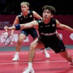 Man Wei Chong (R) will make his Japan Open badminton debut with new men’s doubles partner Soh Wooi Yik. (Photo: AFP)