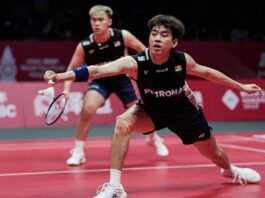 Man Wei Chong (R) will make his Japan Open badminton debut with new men’s doubles partner Soh Wooi Yik. (Photo: AFP)