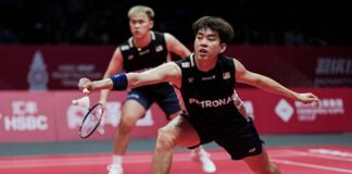 Man Wei Chong (R) will make his Japan Open badminton debut with new men’s doubles partner Soh Wooi Yik. (Photo: AFP)