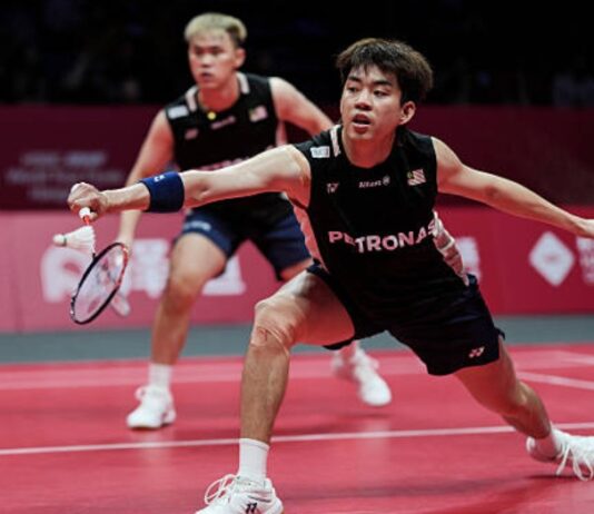 Man Wei Chong (R) will make his Japan Open badminton debut with new men’s doubles partner Soh Wooi Yik. (Photo: AFP)