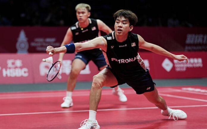 Man Wei Chong (R) will make his Japan Open badminton debut with new men’s doubles partner Soh Wooi Yik. (Photo: AFP) Man Wei Chong (R) will make his Japan Open badminton debut with new men’s doubles partner Soh Wooi Yik. (Photo: AFP)