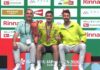 Christo Popov and Fajar Alfian-Muhammad Shohibul Fikri Win Japan Open Titles Christo Popov poses with his father and coach (left), and another coach during the Japan Open badminton award ceremony. (Photo: BWF)
