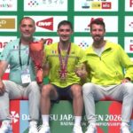 Christo Popov and Fajar Alfian-Muhammad Shohibul Fikri Win Japan Open Titles Christo Popov poses with his father and coach (left), and another coach during the Japan Open badminton award ceremony. (Photo: BWF)