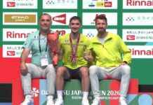 Christo Popov and Fajar Alfian-Muhammad Shohibul Fikri Win Japan Open Titles Christo Popov poses with his father and coach (left), and another coach during the Japan Open badminton award ceremony. (Photo: BWF)