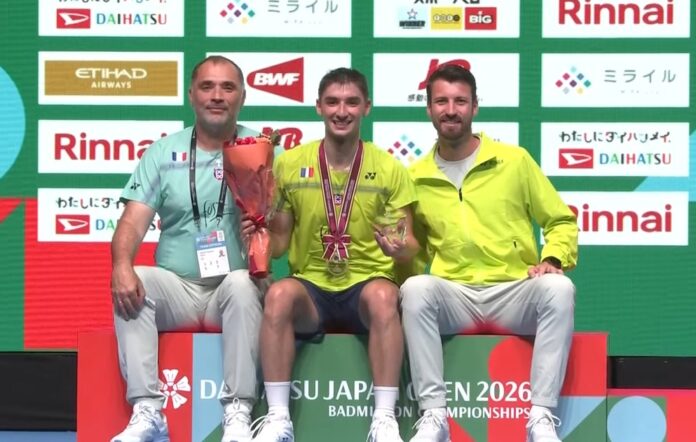 Christo Popov poses with his father and coach (left), and another coach during the Japan Open badminton award ceremony. (Photo: BWF) Christo Popov poses with his father and coach (left), and another coach during the Japan Open badminton award ceremony. (Photo: BWF)