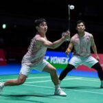 Goh Sze Fei and Nur Izzuddin battled through a difficult three-game match to reach the China Open second round. (Photo: AFP)