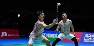 Goh Sze Fei and Nur Izzuddin battled through a difficult three-game match to reach the China Open second round. (Photo: AFP)