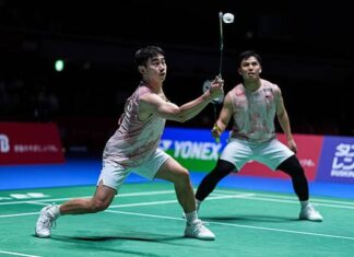 Goh Sze Fei and Nur Izzuddin battled through a difficult three-game match to reach the China Open second round. (Photo: AFP)