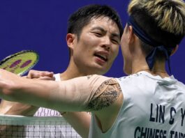 Chou Tien Chen shakes hands with Lin Chun-Yi after defeating his compatriot in the 2026 China Open badminton semifinals. (Photo: AFP)